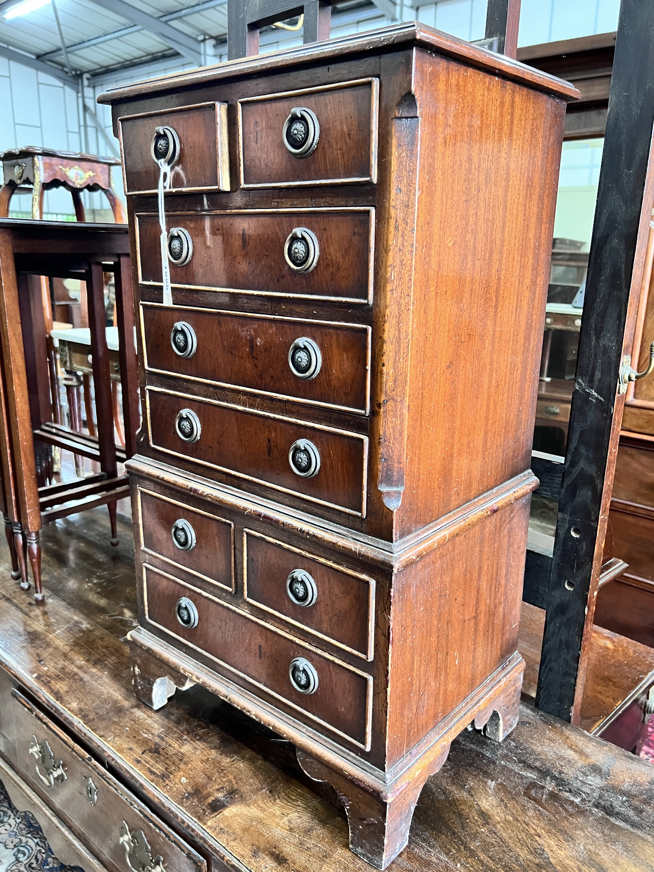 A small reproduction mahogany chest, width 41cm, depth 29cm, height 76cm